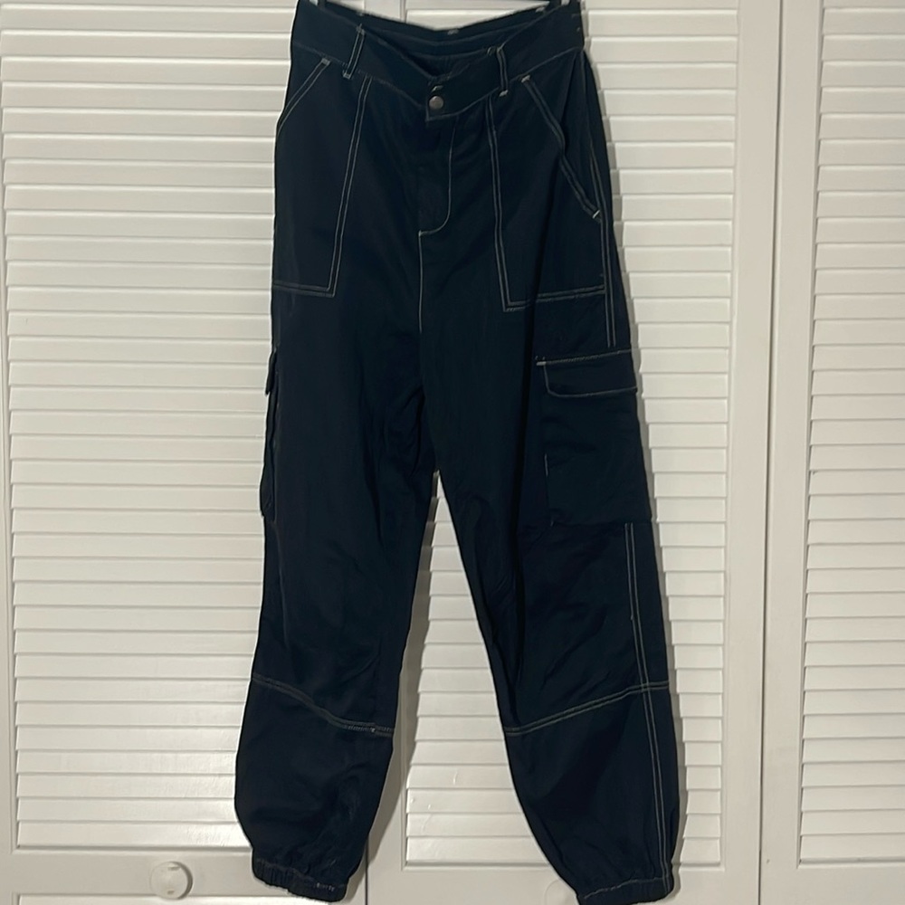 Black cargo pants with white stitching